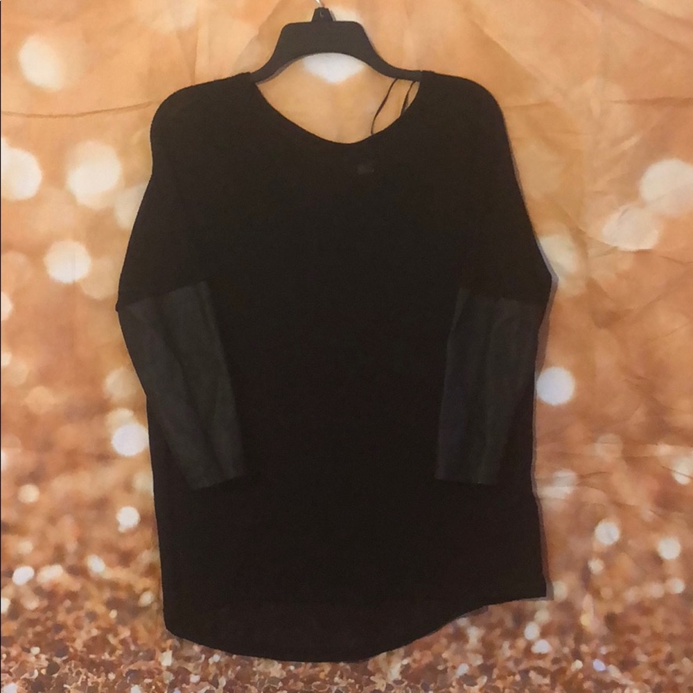 Oversized black sweater with PU sleeves